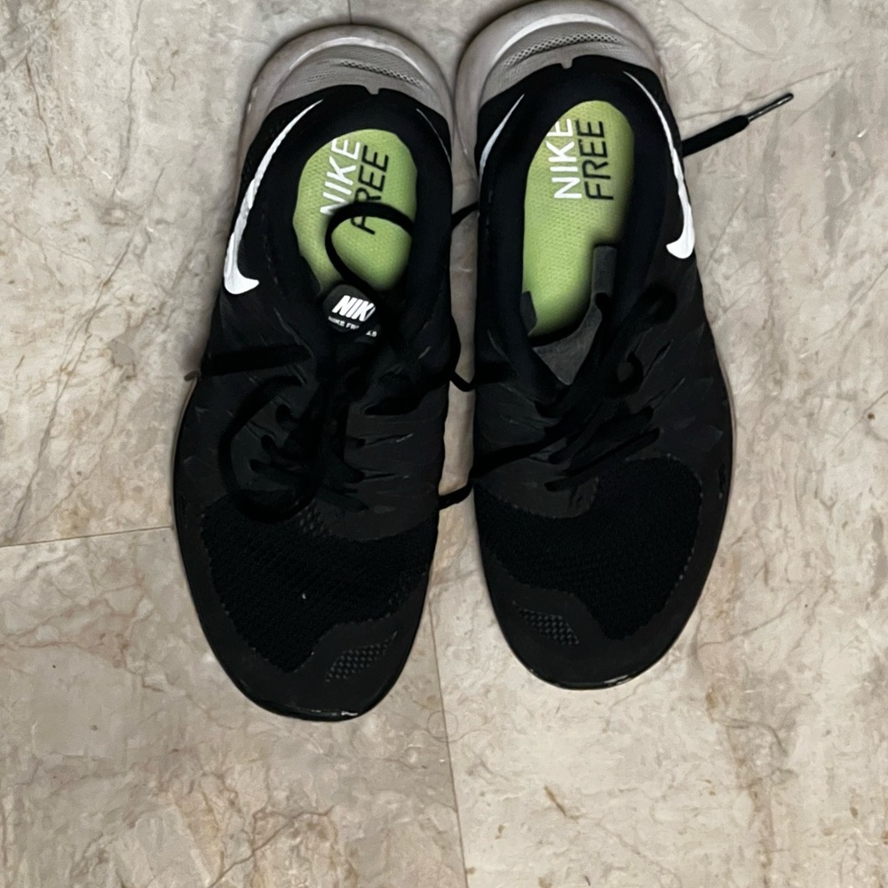 Womans Nike black and green sneakers